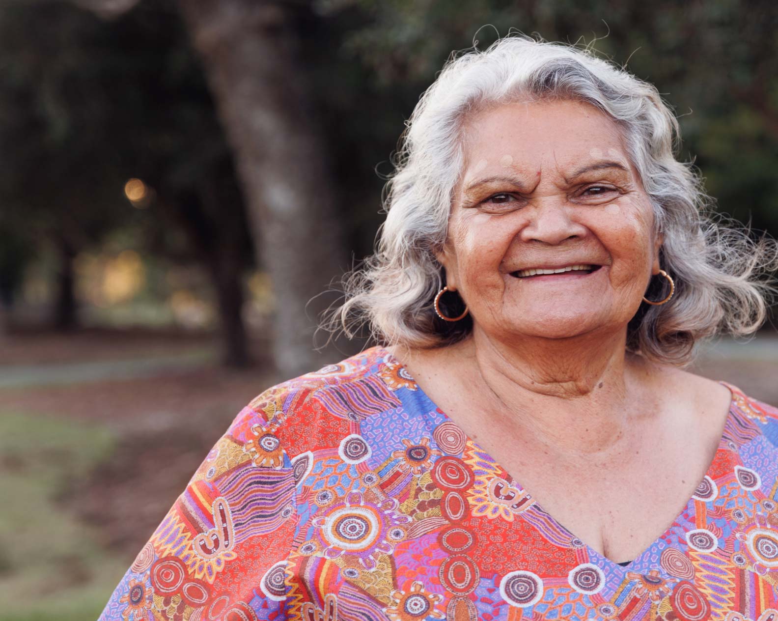 Older indigenous female smiling