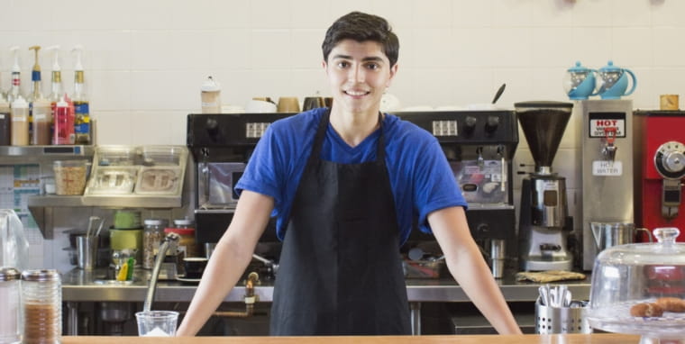 Young teen working at cafe